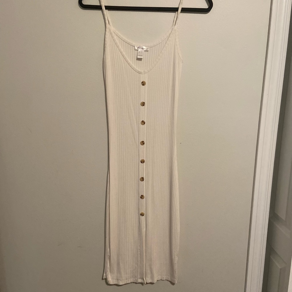 White ribbed dress with front slit midi length